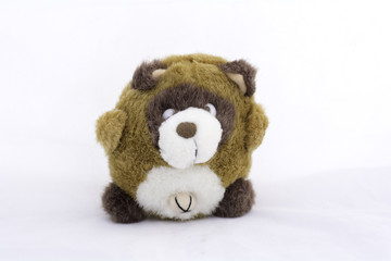 stuffed animal toy on a white background .