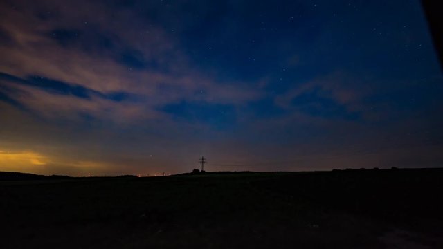 Timelapse from star trails at night to sunrise
