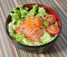 Bowl of Boiled Rice Topping with Salmon and Vegetable