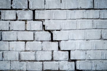 Brick wall with a crack