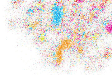 Colorful explosion of confetti. Isolated on black background. Coloured glitter and sprinkles. Grainy abstract holiday illustration. Multi colored texture.