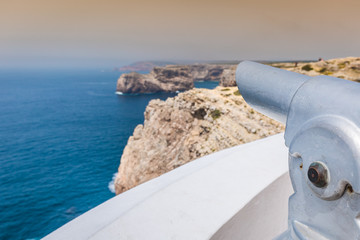 High cliffs and blue ocean at Cabo Sao Vicente on coast of Portu