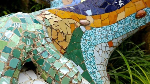 Details of the arch of colonnaded footpath in Antoni Gaudi's Park Guell, Barcelona, Spain