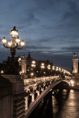 Fototapeta na wymiar Pont Alexander III bridge at dusk in Paris, France