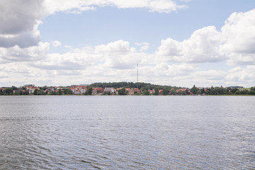 Fototapeta na wymiar Lake Czos in the city of Mragowo, Mazury region, Poland