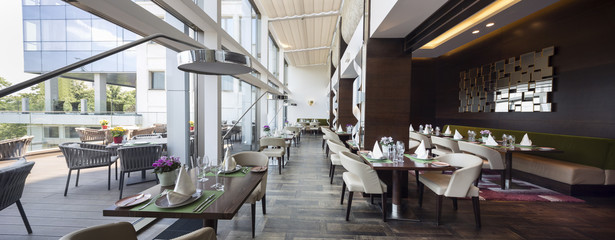 Modern restaurant interior, part of a hotel - obrazy, fototapety, plakaty