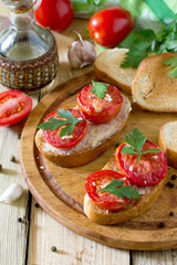Italian tomato bruschetta with sun dried tomatoes, herbs and but
