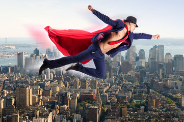 Obraz na płótnie Canvas Superman and the city in concept