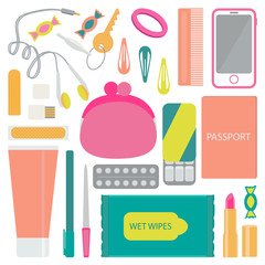 Headphones, candy, purse, hair scrunchies, hair pins, comb, cell phone, hygiene pad, flash card, adhesive tape, gum,, nail file, pen, lipstick, passport, hand cream. 