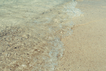wave of the sea on sand beach