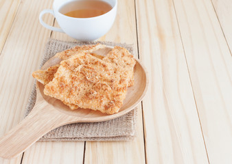 Rice with pork snack in wooden plate