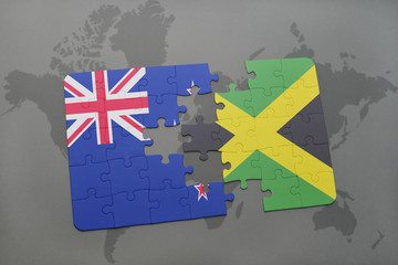 puzzle with the national flag of new zealand and jamaica on a world map background. 3D illustration