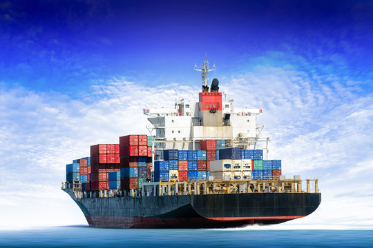 Cargo ship in the ocean with  blue sky, Freight Transportation.