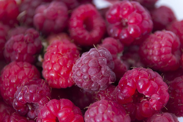 Detail of red rasberry of pink color image