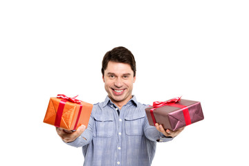 Present gift holding man looking camera.
