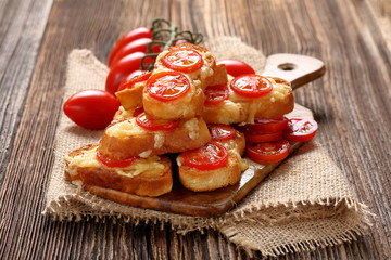 Grilled toast with cheese and tomatoes