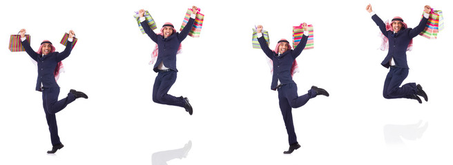 Arab man with shopping gifts on white