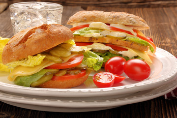 Fresh vegetarian sandwiches with tomato and cucumber on the plate