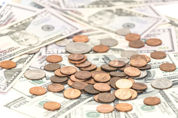 One hundred and fifty dollars banknotes with cents and quarters coins