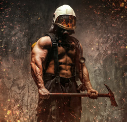 Fireman in fire sparks and smoke.