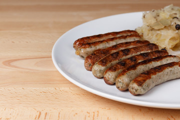 Authentic sausages from Nuremberg Bavaria with Sauerkraut and Roll