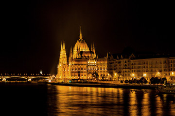 Fototapeta na wymiar Parliament Building Boats Danube River Night Budapest Hungary