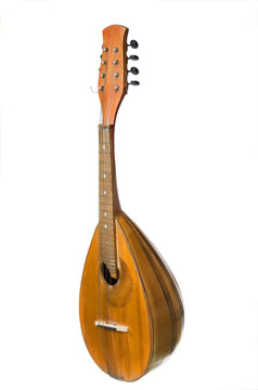 Mandolin on a white background, old musical instrument.