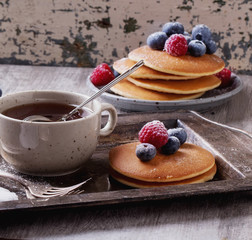 Pancakes with Berries and tea
