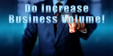 Businessman Pressing Do Increase Business Volume!