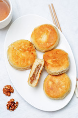 Korean sweet pancakes with nuts topping. Hotteok