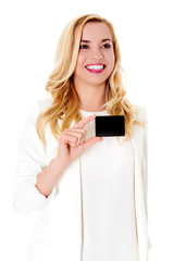 Happy woman showing business card, isolated over white backround.