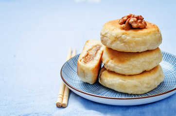 Korean sweet pancakes with nuts topping. Hotteok