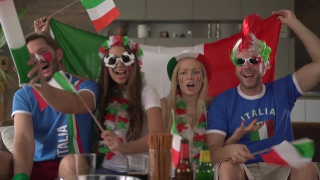 four happy italian soccer fans
