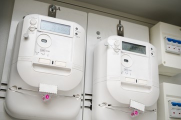 Electric energy meter. Pair of electrical units - obrazy, fototapety, plakaty