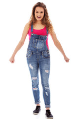 Angry screaming young woman with clenched fist