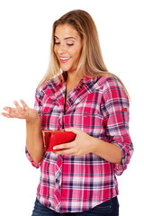 Smiling woman holding wallet and gesturing dont know