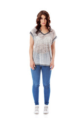 Young unhappy woman with long dark hair.