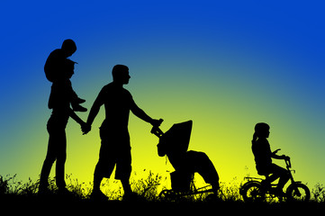 Fototapeta na wymiar large family walks at sunset