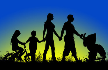 Fototapeta na wymiar silhouette of a large family that walks at sunset