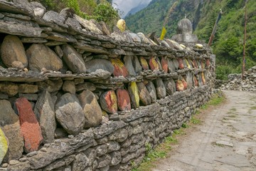 Fototapeta na wymiar Buddhists Symbols in Nepal, Annapurna Trail