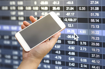 Smartphone on hand with stock market number