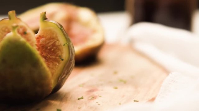 Figs and honey on a wooden table selective focus.