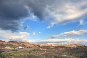 Fototapeta premium Van at the road in dessert