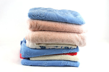 stacking bath towels isolated on white background