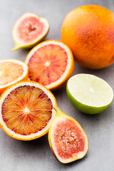 Bloody Sicilian oranges and figs. Shallow depth of field.