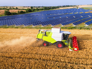 Aerial view of combine on harvest field