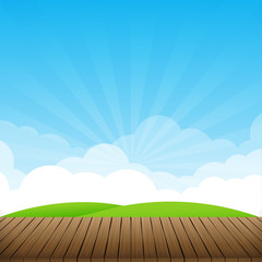 Obraz premium Brown wood floor with green field and blue sky background empty
