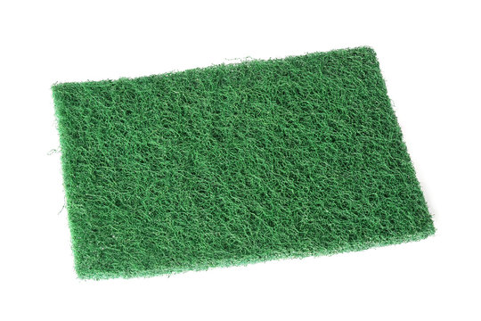 Green fiber scourer pad on white background