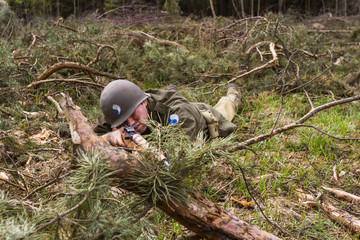 American World War II infantry soldier prepering for shooting