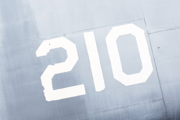 Painted number on an old war plane